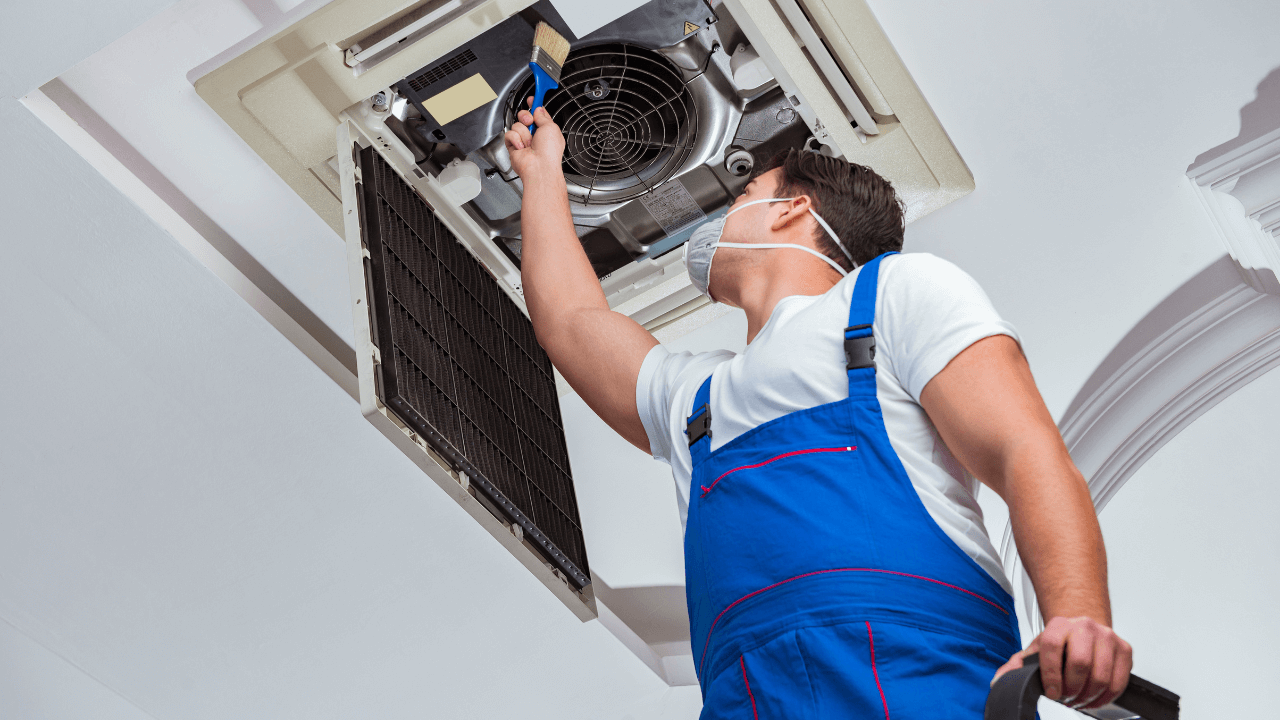 Expert AC repair service near me in Bangalore – Skilled technician fixing a AC